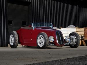 Low, slick, heavily modified 1927 Model T roadster with a track-nose grille