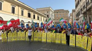 The purpose of the session was to discuss Iran, and Mrs. Rajavi had been invited as a special guest. As she entered the Parliament, a group of Iranians and supporters of the NCRI gathered outside to show their support and welcome her.