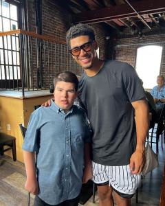 NJ Jets Wide Receiver Allen Lazard standing next to Cole for his 18th birthday.