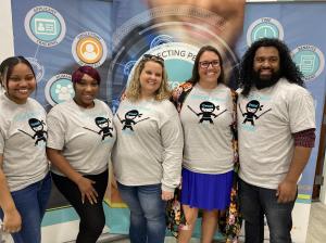 Nia, Shante, Amber, PJ & Pradeep, Support Team at Thread, pose for a team photo.