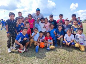 Checho and the kids in Copa Ocho Sur