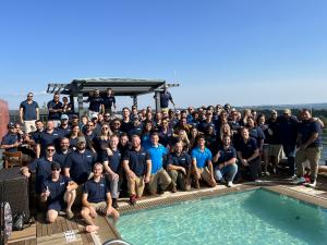 A group photo of Home Genius Exteriors team members