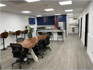 Listing photo of modern executive office interior at Marin Corporate Center, including professional office furniture. Photo courtesy of Peak Commercial.