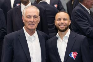 NBA Legends, Rick Barry and Stephen Curry pose for a photo during the NBA 75 Group Photo as part of the 2022 NBA All Star Weekend on February 20, 2022 at Rocket Mortgage FieldHouse in Cleveland, Ohio.