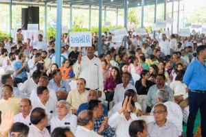 Unity in Diversity: Residents from 60 villages proudly unite, raising their banners in celebration