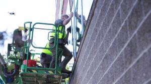 INOVUES retrofit installation on exterior with drone