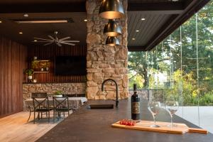 indoor/outdoor cabana space with full glass doors for an easy open