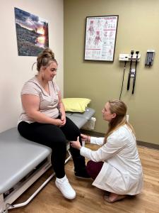 Emily Stevenson, PA-C examines a patient.