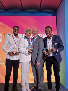 Nery Santaella and Voices Of Venezuela cofounder Jason Rovig, pose with VAS Hub's Nazir Atul & Emmanuel Mushy after the SDG Action Award ceremony.