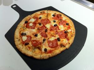 Image shows picture of one of the HOT ITALIAN current fan favorites trending DoorDash —The Materazzi Pizza (tomato sauce, fontina cheese, pepperoni, oli
