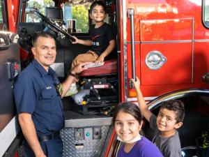 Clamber aboard a fire truck on National Night Out