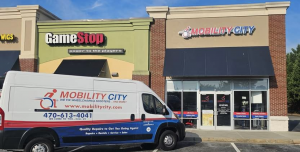 Photo of storefront of Mobility City of Lawrenceville GA with Van,  located at: 65 Lawrenceville-Suwanee Road, Suite 14, Lawrenceville, GA 30044, (470),613-7909