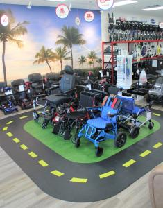 Photo ofMobility City of Boac Raton Showroom Floor featuring a mural, test track for customers to train on equipment, and mobility equipment