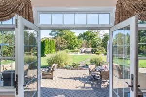 Boulders Run French Doors to Paver Patio & Backyard