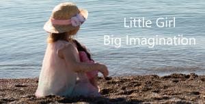 Little girl imagination sitting on the beach