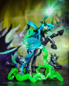Evil Chrysalis emerges from the shadows in this toy photograph.