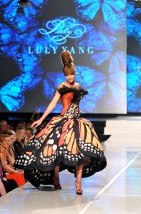 Model is wearing Luly Yang's original design, the monarch Butterfly gown on the runway at Monarch's Tale fashion show in 2012