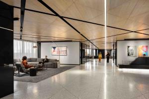 Terrazzo floor patterns echoed in the ceiling patterns