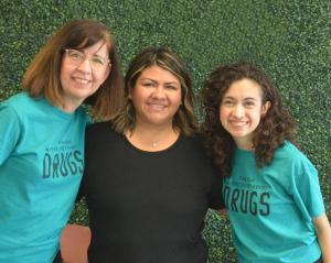Virginia (center) joins the team from Bridge Publications on their drug education initiative.
