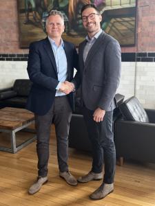 An image of Ray Vasey welcoming Charlie Burtt to the office at Spitfire Consultancy