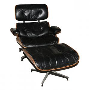 Charkes and Ray Eames mid-century lounge chair and ottoman set by Herman Miller, black leather with a 14-inch seat height (est. $1,000-$2,000).