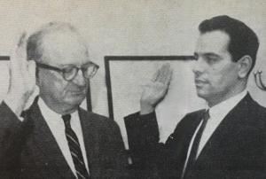 man administering oath to another man