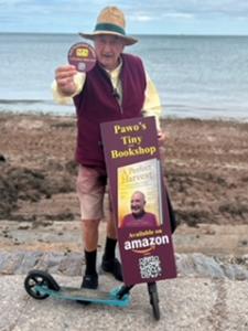 Author Monk on a scooter