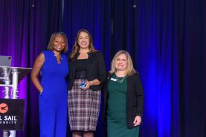 Maryann Kilgallon of POMM Safety Platform is presented with the Women Who Win Member of the Year Award