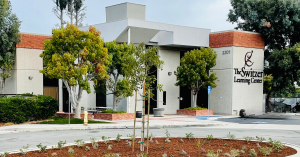 Photo of school with trees.