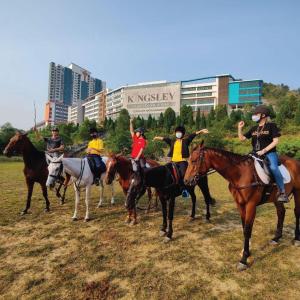 Through horse riding, students learn valuable skills such as building confidence in interacting with animals, actively listening to instructions and enhancing hand-eye coordination.