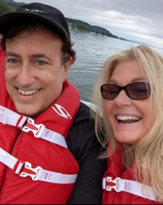 Richard Rossi on the left and Kelly Tabor on the right are on a paddleboat on Lake Champlain