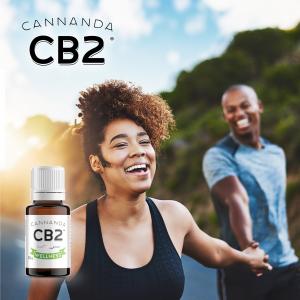 A happy young couple outdoors, with Cannanda CB2 oil terpene vial