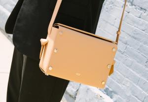 Crossbody leather bag in Cashew color
