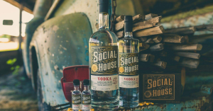 SOCIAL HOUSE® Vodka displayed on pickup truck, highlighting craft distillery brand's local Eastern North Carolina roots