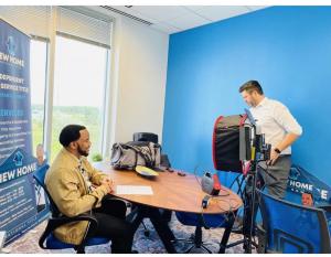 Richard Simon, owner & founder of New Home National Title on set