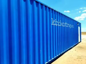 blue shippoing container with door