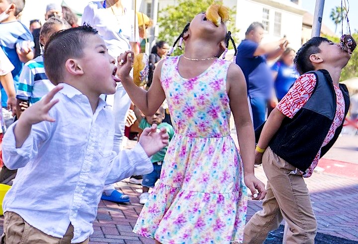 Donut-eating contest at the Church of Scientology Los Angeles—a favorite event for local children.
