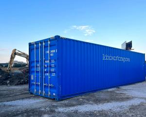 Photo: Blue Shipping Container words on the side "kickboxleasing.com"