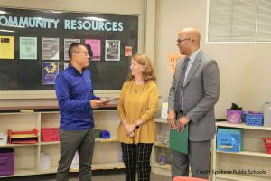 Sam Song, President of the Spokane Public Schools Foundation, receives a gift of $75K from Barbara Richardson and Warren Brown, of College Spark Washington, a foundation that supports equity in education.