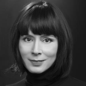 A Headshot of Traci L. Slatton, the filmmaker to,