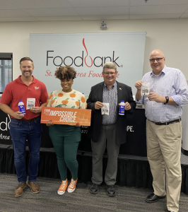Photo Caption from L to R: Darin Copeland, Prairie Farms Dairy; Jasmine Evans, St. Louis Area Foodbank, Derek England, Prairie Farms Dairy; Alan Reed, Bigger Table.