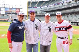Chicago White Sox manager and Excelsior University alumnus Pedro Grifol,  Excelsior University president David Schejbal, Excelsior University Board of Trustees chair Matt Loeb, and Chicago White Sox infielder Zach Remillard (left to right) at Excelsior University Day