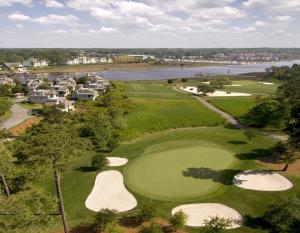 Dive into the challenge of Tidewater Golf Club's 17th hole – where every swing counts in this breathtaking coastal oasis.