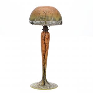 French cameo art glass table lamp signed Daum Nancy boasting a beautiful winter scene cameo cut and enamel décor, 18 inches tall with the original fittings (est. $8,000-$12,000).