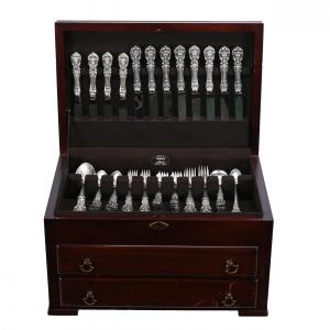 96-piece sterling silver flatware set by Reed & Barton in the Francis I pattern, the silver weighing 3,225 grams, in a wooden chest with a key (est. $2,500-$4,000).