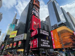 Ashley Judd & Anthony Edwards Launch END1IN4 Child Sex Abuse Campaign, Lighting Up Times Square; Across Miami; & in L.A.