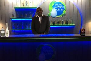 Chris Ryan from Pure Organic Drinks behind the bar