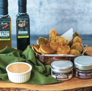 Fried pickles in a bowl on a table.