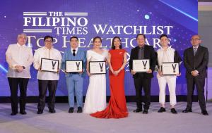 TFT Watchlist Awards judges and Philippine dignitaries with Dr. Karen Remo, CEO and Founder of New Perspective Media Group, and Chair of The Filipino Times Watchlist on stage during the event