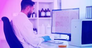 Lab tech performing DMR on Techcyte with culture plate